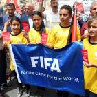 وقفة تضامنية لدعم التوجه لطرد اسرائيل من الفيفا وسط رام الله