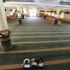 اطفال يقرأون القران في مسجد تميم الداري في رام الله‎