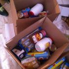 بالصور: توزيع طرود غذائية على القدس