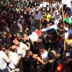 جماهير غاضبة تشيع جثمان الشهيد سعد دوابشة