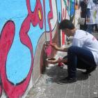 بالصور: المبادرات الشبابية ترسم جدارية 