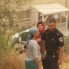 نورا نصار مديره مدرسة قرطبه في البلدة القديمه في مدينة الخليل والاسرة التربوية تدخل المواد الغذائيه للطلبة رغم انف المستوطنيين