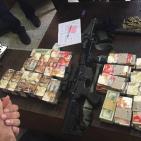 الأموال التي تم استرجاعها من اللصوص الذين سرقوا بنك الإستثمار ... بقيمة 2.5 شيكل