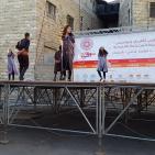 فرقة الهدف للدبكة  الشعبية و فرقة كنعان للتراث والفنون الشعبية في سوق الحرجة رام الله