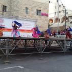 فرقة الهدف للدبكة  الشعبية و فرقة كنعان للتراث والفنون الشعبية في سوق الحرجة رام الله