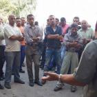 موظفو بلدية دورا ينظمون وقفة تضامنية على قانون التسكين