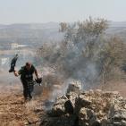 بلعين في مسيراتها  والاحتلال بقمعه