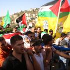 تشييع جثماني الشهيدين محمد شماسنة وعمر الفقيه في بلدة قطنا شمال غرب القدس،