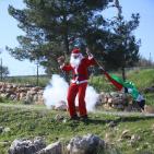 الاحتلال يقمع مسيرة بابا نويل في بلعين