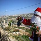 الاحتلال يقمع مسيرة بابا نويل في بلعين