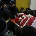 الشهيد حسين أبو غوش من مخيم قلنديا خلال وداعه في مجمع فلسطين الطبي في رام الله‎