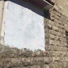 الاحتلال يزيل جزء من جدارية في بلدة سلوان