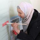 النجاح التطوعية والخدمة المجتمعية في النجاح يُنظمان نشاط رسم في إحدى المدارس