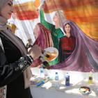 رسم جدارية الحرية في مدرسة بنات الازور في البيرة