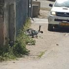 بالصور: مستوطن يدهس شابا بالخليل