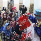 المشروبات الوطنية كوكاكولا/ كابي وراية اف ام  يعيدان على أيتام الجمعية الخيرية الاسلامية بالخليل