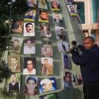 شجرة الميلاد بالعيزرية.. بصور الشهداء