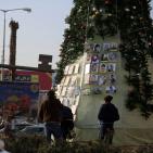 شجرة الميلاد بالعيزرية.. بصور الشهداء