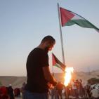 رفع العلم الفلسطيني تحت شعار 