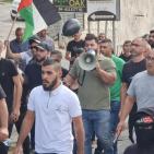 بالصور.. تظاهرة في أم الفحم احتجاجا على جرائم القتل وتواطؤ الشرطة