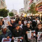 صور: فعاليات إسنادية للأسير ناصر أبو حميد في رام الله ونابلس