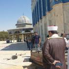 بالصور: أوقاف القدس تصلح تسريب في