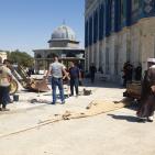 بالصور: أوقاف القدس تصلح تسريب في