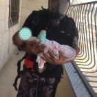 حريق في عمارة سكنية في بلدة الرام شمال القدس