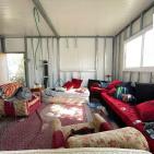 بالصور: الاحتلال يجبر مقدسيا على هدم جزء من منزله في حي الطور