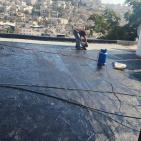 مباشرة العمل على ترميم المنازل في الخليل