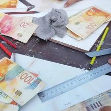 خاص | فوضى نقدية تضرب أسواق غزة مع انتشار العملة التالفة وشح السيولة