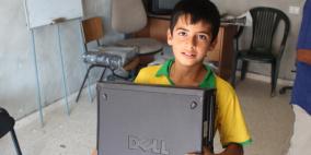 مؤسسة رواد الغد توزع 72 جهاز حاسوب على مشتركيها في مزارع النوباني و75 جهاز حاسوب في قرية بلعين