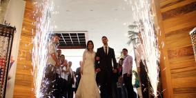 عروسان يفتتحان معرض "أفراحنا" في رام الله