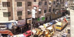 إعادة فتح عشرات المتاجر كان الاحتلال قد اغلقها قبل 21 عاما  في الخليل