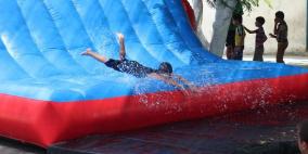 بالصور.. "ألعاب الصيف" تٌسعد أطفال غزة