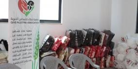 عطاء فلسطين توزع كفالات الأيتام الشهرية الخاصة بشهري 1+2/2017م.