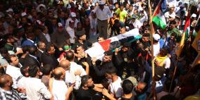 جماهير غاضبة تشيع جثمان الشهيد دوابشة