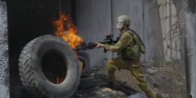 من المواجهات التي اندلعت قرب حاجز قلنديا بذكرى "يوم الارض"