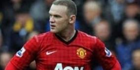 صحافي التقط صورا لروني مع زوجته فـضربه على رأسه