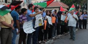 نابلس: وقفة احتجاجية ضد مجزرة وجريمة إحراق المستوطنين لعائلة الدوابشة