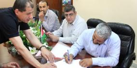 بلدة قوصين توقع اتفاقية نقل الخدمة الكهربائية الى  كهرباء الشمال