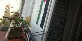 علم فلسطين على كل شباك في حيفا العربية