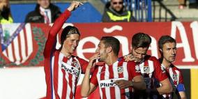 أتلتيكو يستعيد الوصافة بثلاثية في غرناطة ويزيد الضغط على البرسا