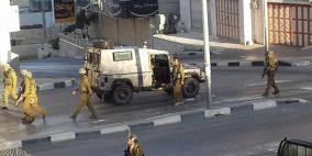 إصابات بالرصاص المعدني والغاز في مواجهات بالخليل