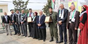 "القدس المفتوحة" في رام الله والبيرة تؤبن شهداءها