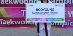 الاتحاد الفلسطيني يُكرم امام العالم في افتتاحية بطولة العالم للتايكواندو