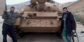 بالصور : من غزة الى دمشق.. مقاتلون بلا قضية