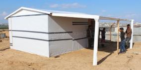 بالصور .. البيت الخشبي يتحدى منع مواد البناء