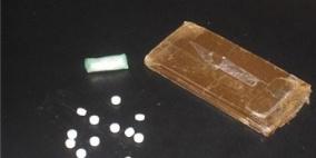 الامن الوقائي يضبط عصابة من يطا بحوزتها 22 بلاطة حشيش