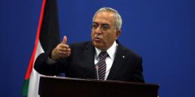 فياض يحذر من تفاقم الأزمة المالية في حال عدم تفعيل قرار القمة العربية